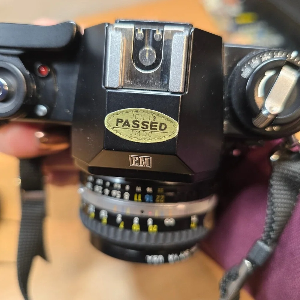 Nikon‎ EM 35mm Camera body lens series e flash cases for camera manuals timer